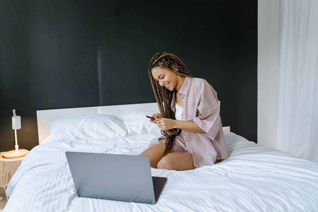 Woman sitting on her phone