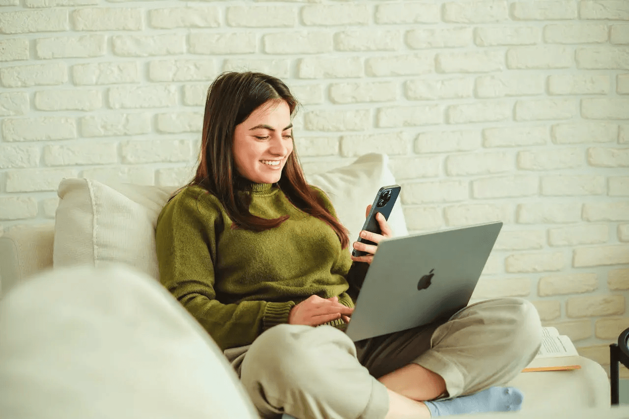Woman using a laptop at home